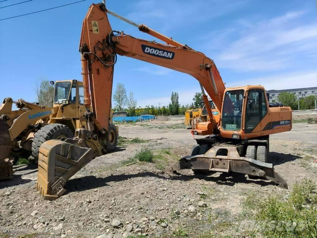 Doosan DH210W-7 حفارات بعجل