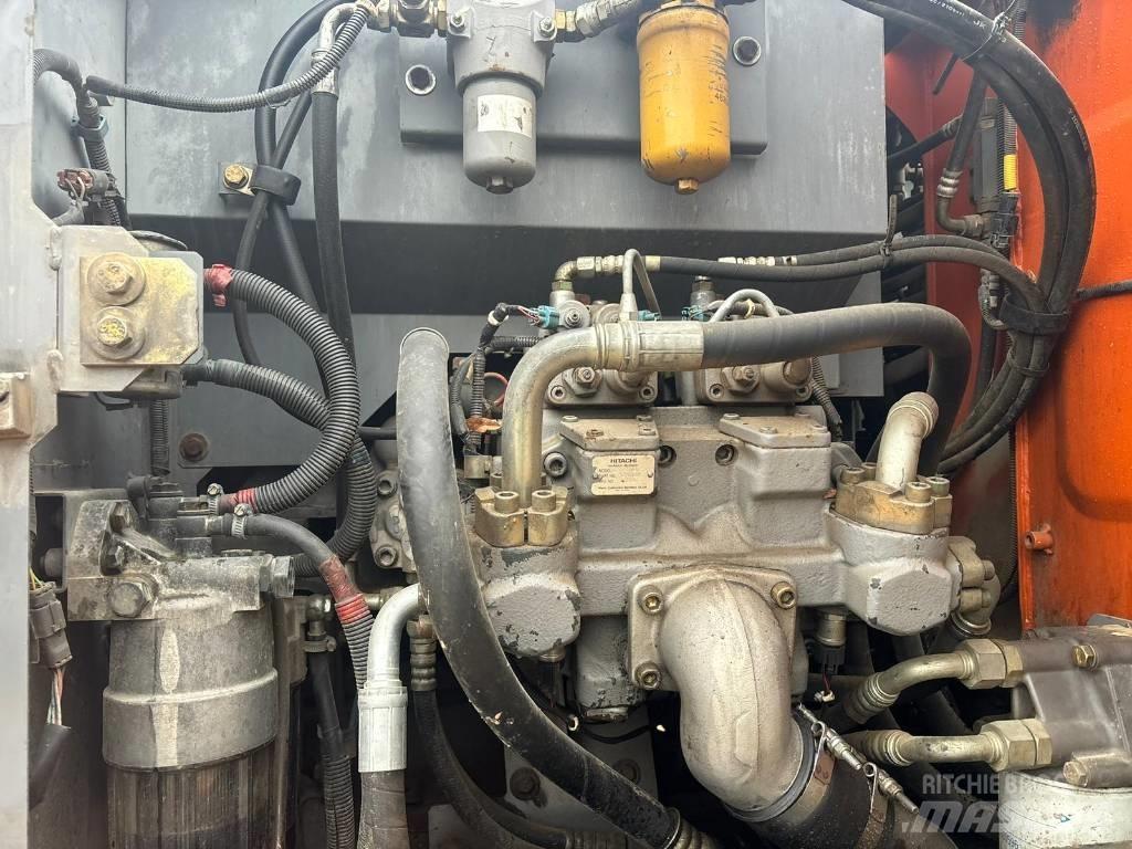 Hitachi ZX 140 W-3 حفارات بعجل