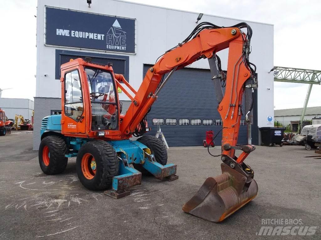 Mecalac 12MXT حفارات بعجل