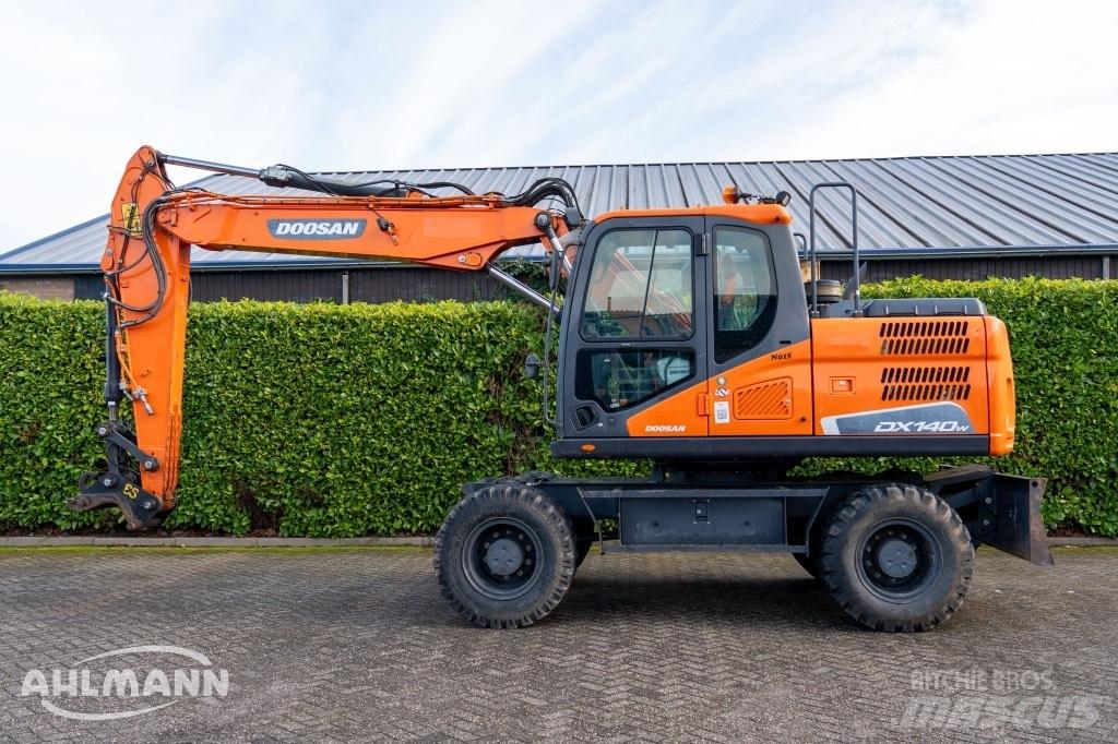 Doosan DX140W-5 حفارات بعجل