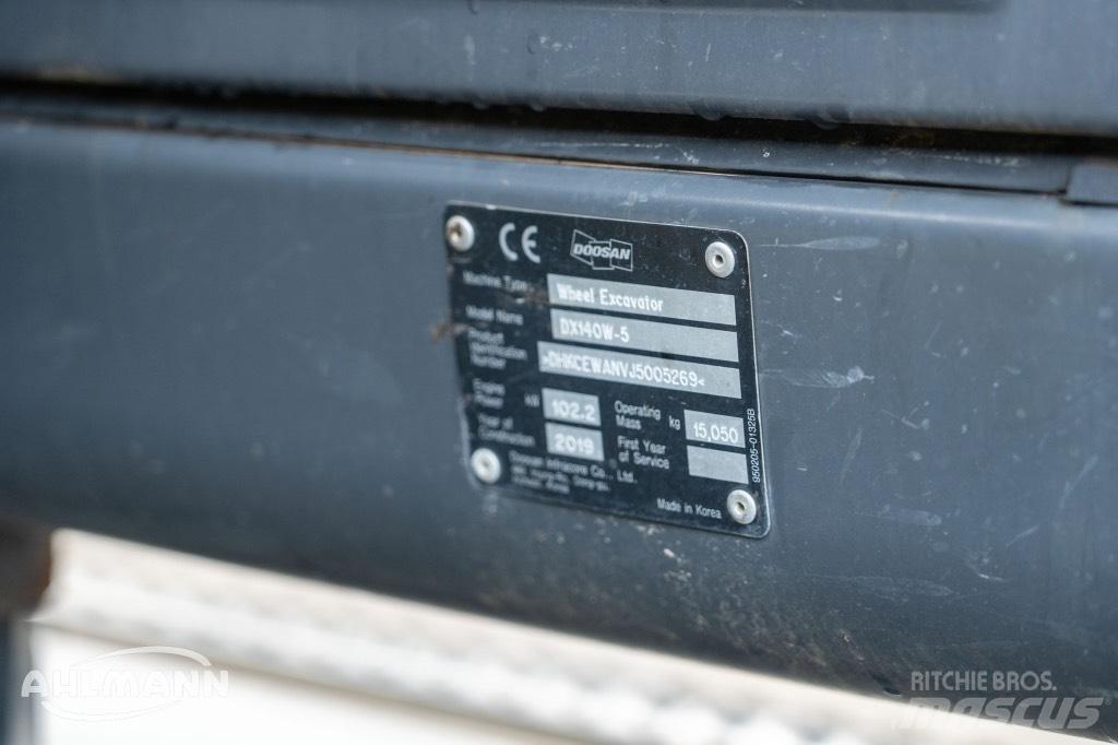 Doosan DX140W-5 حفارات بعجل