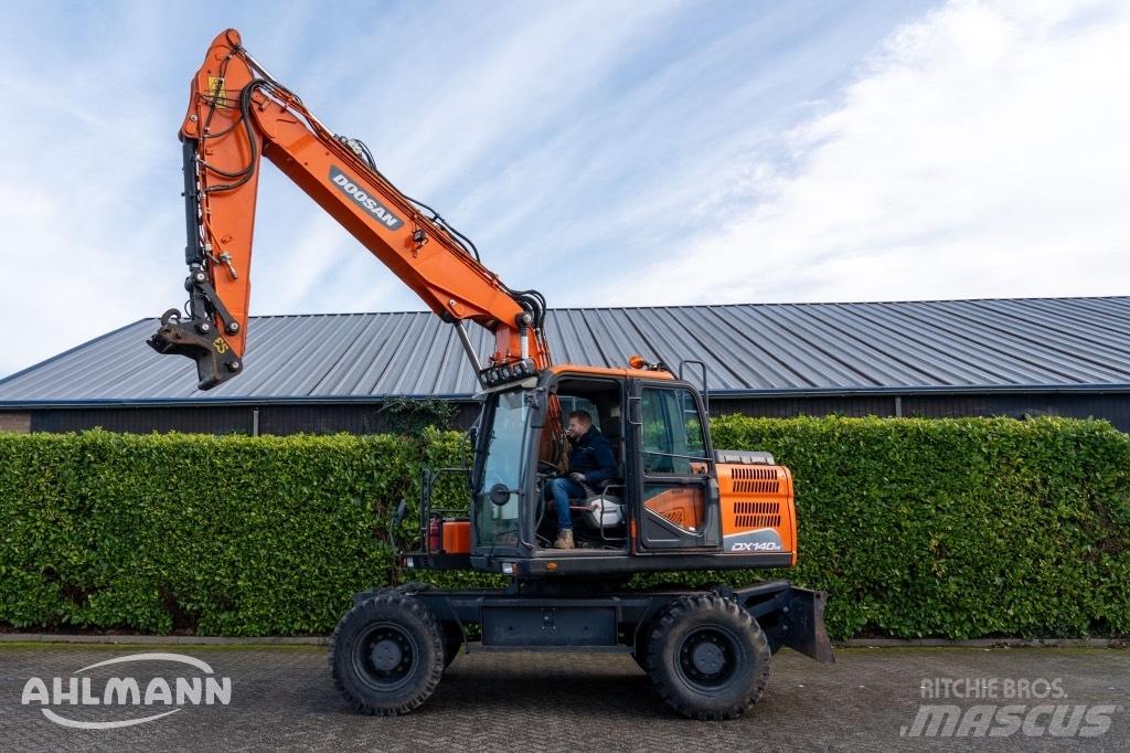 Doosan DX140W-5 حفارات بعجل