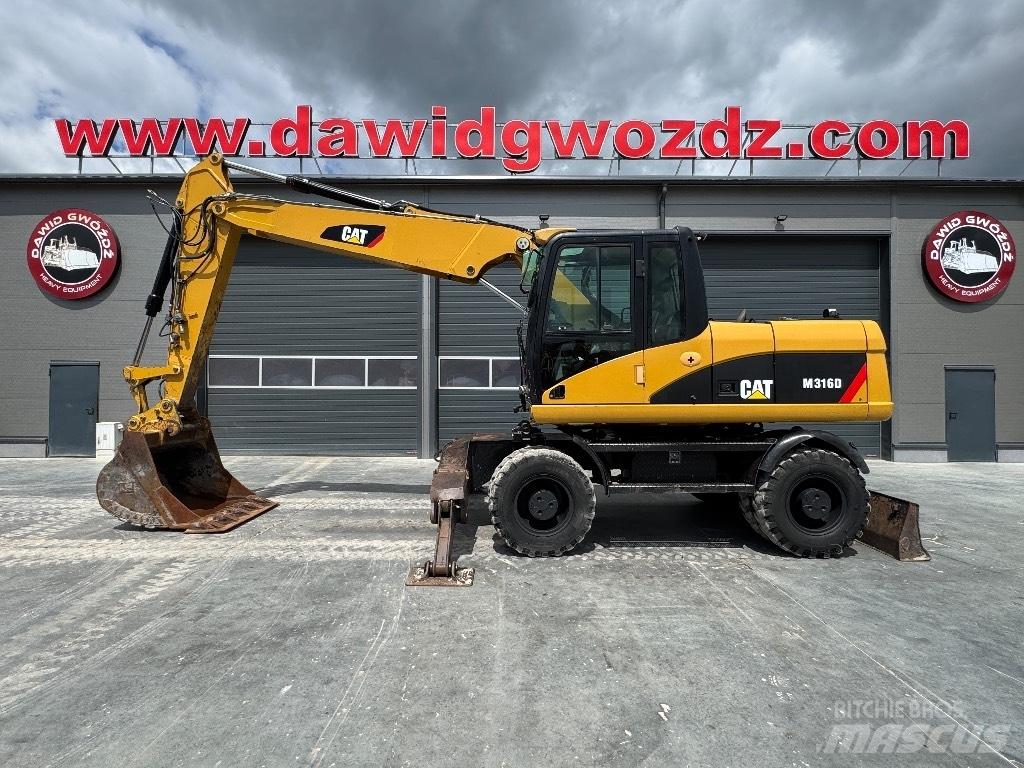 CAT M 316 D حفارات بعجل