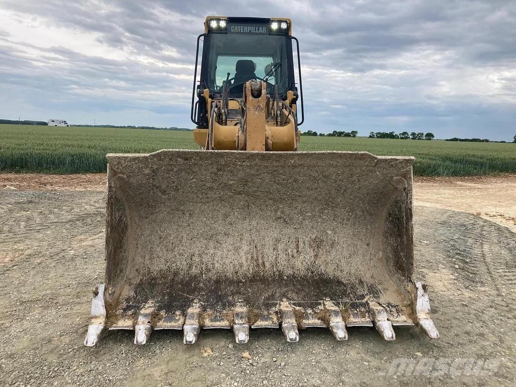 CAT 963K لوادر بعجل