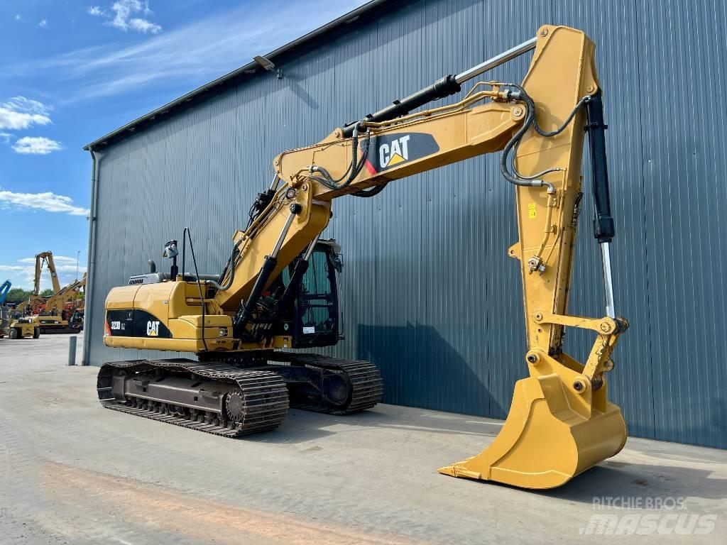 CAT M316C حفارات بعجل