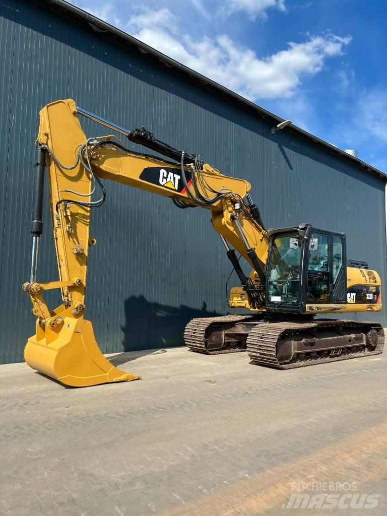 CAT M316C حفارات بعجل