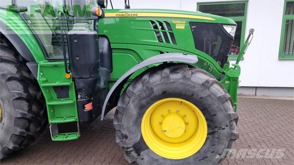 John Deere 6195m الجرارات