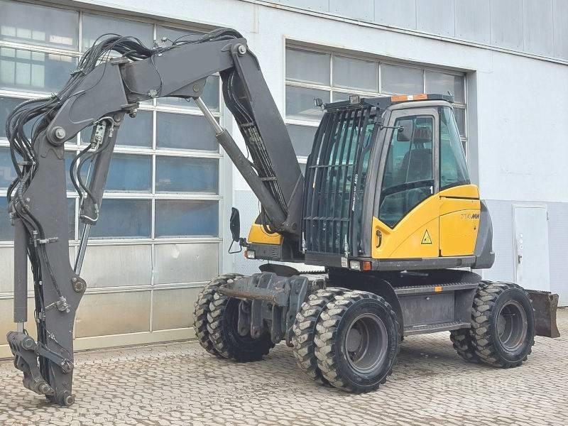 Mecalac 714 MW حفارات بعجل