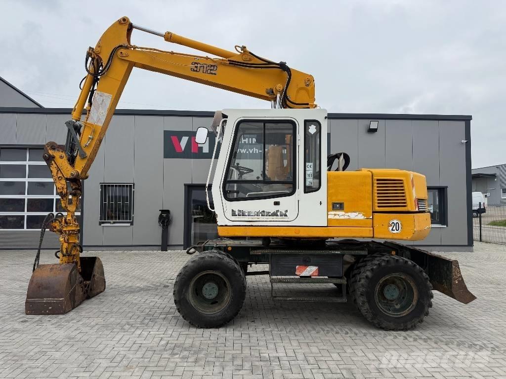 Liebherr A 312 حفارات بعجل