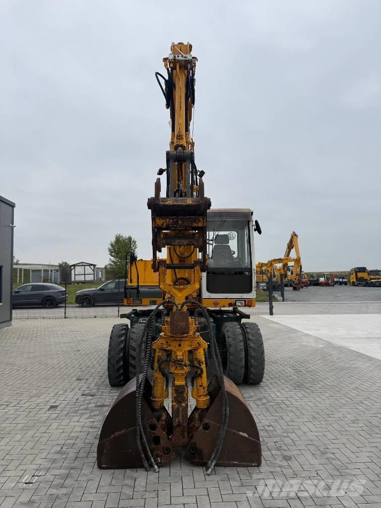 Liebherr A 312 حفارات بعجل