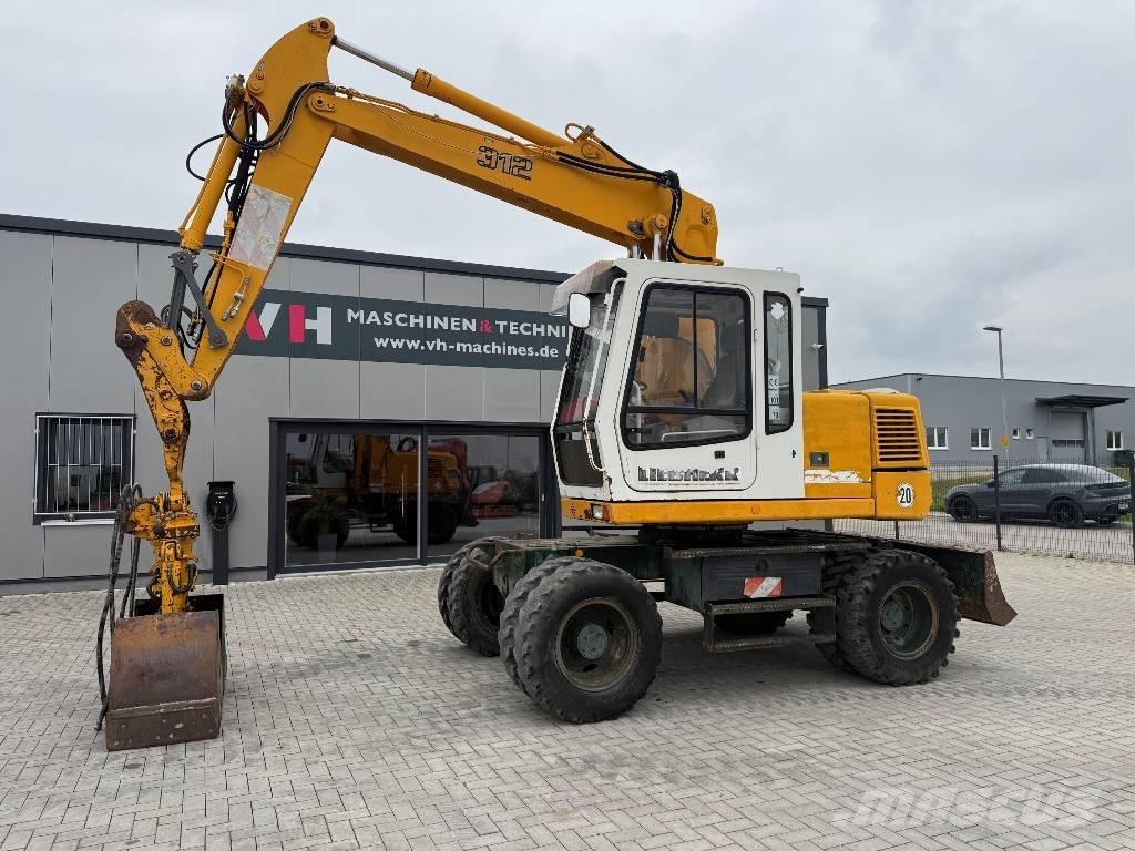 Liebherr A 312 حفارات بعجل