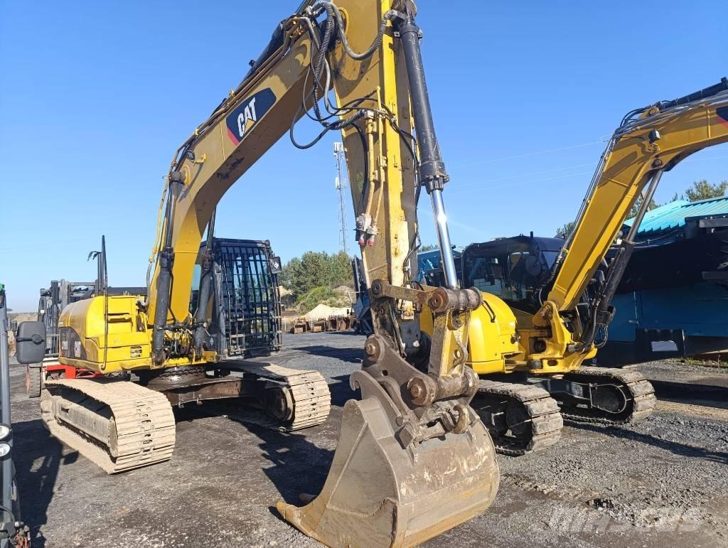 CAT 319D حفارات زحافة