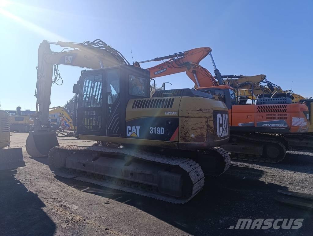 CAT 319D حفارات زحافة
