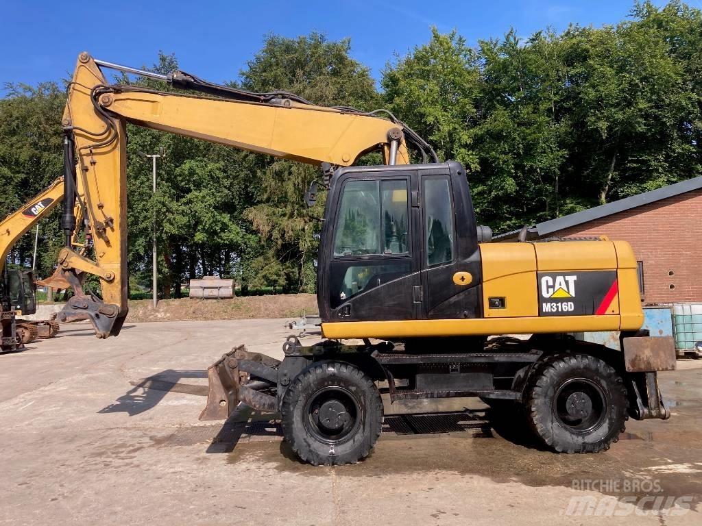 CAT M 316 D حفارات بعجل