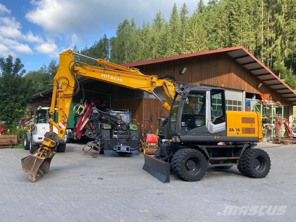 Hitachi ZX 140 W-3 حفارات بعجل