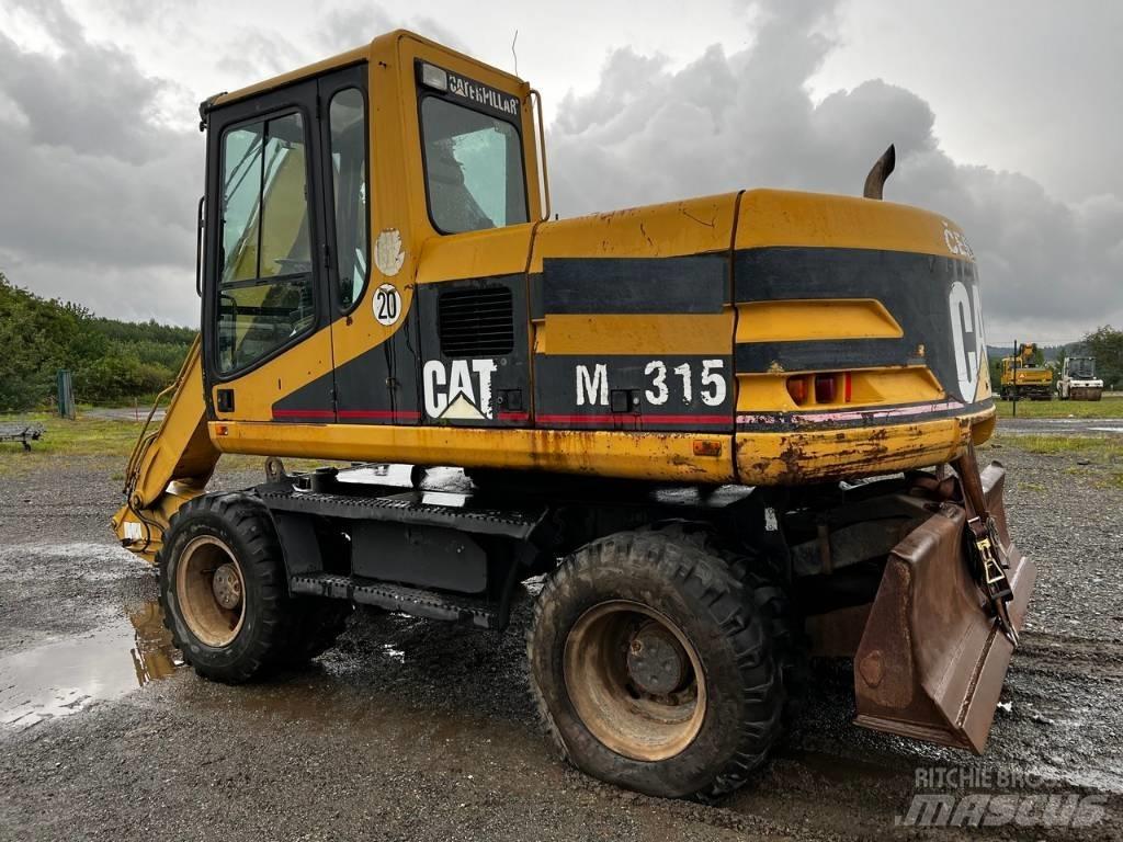 CAT FOR PARTS M 315 حفارات بعجل