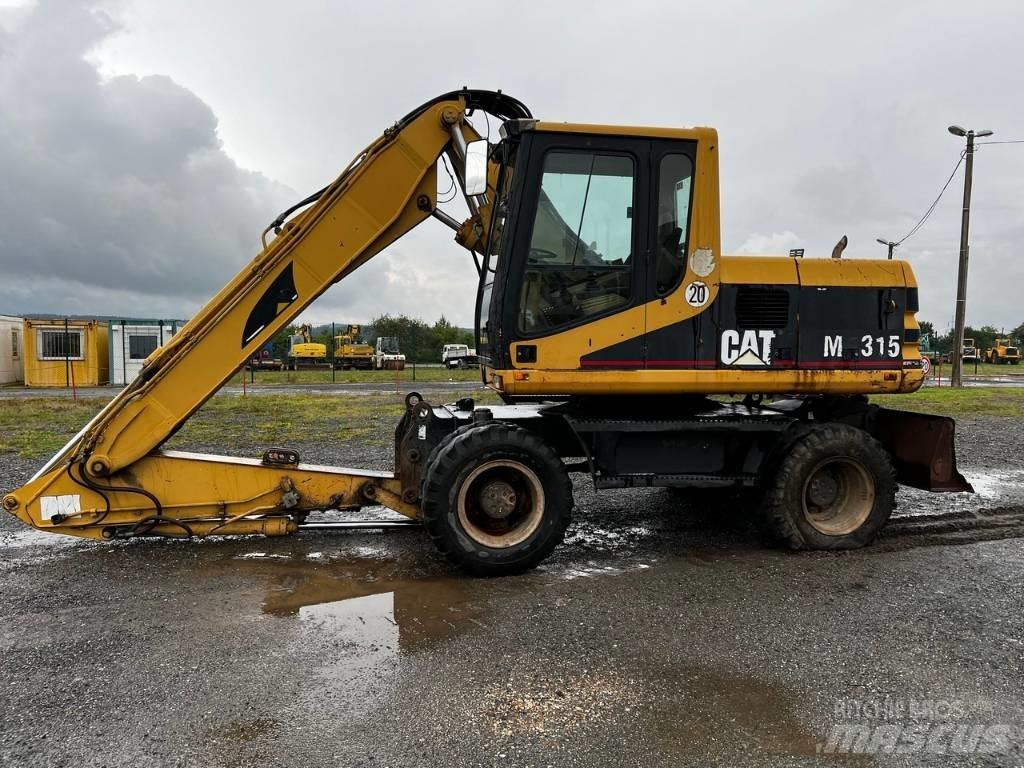 CAT FOR PARTS M 315 حفارات بعجل