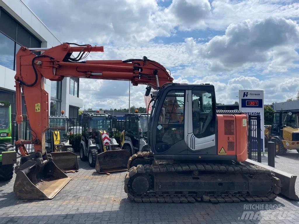 Hitachi ZX135US-3 حفارات زحافة