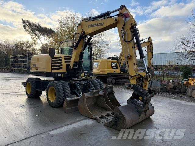 Yanmar B 95 W حفارات بعجل