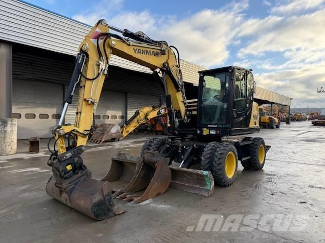 Yanmar B 95 W حفارات بعجل