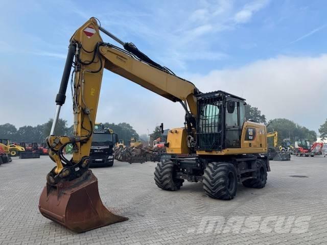 CAT M 320 F حفارات بعجل