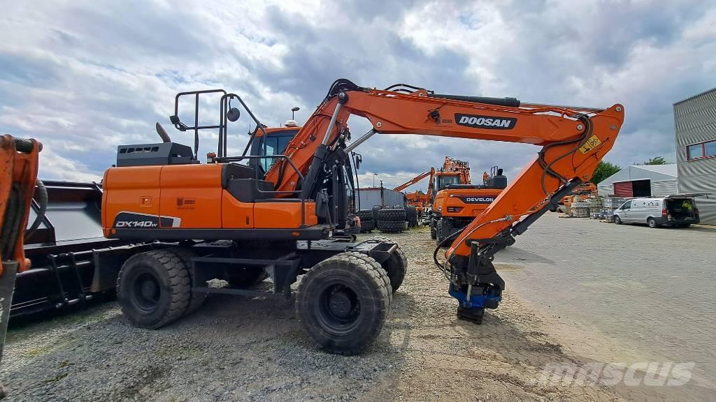 Doosan DX140W-5 حفارات بعجل