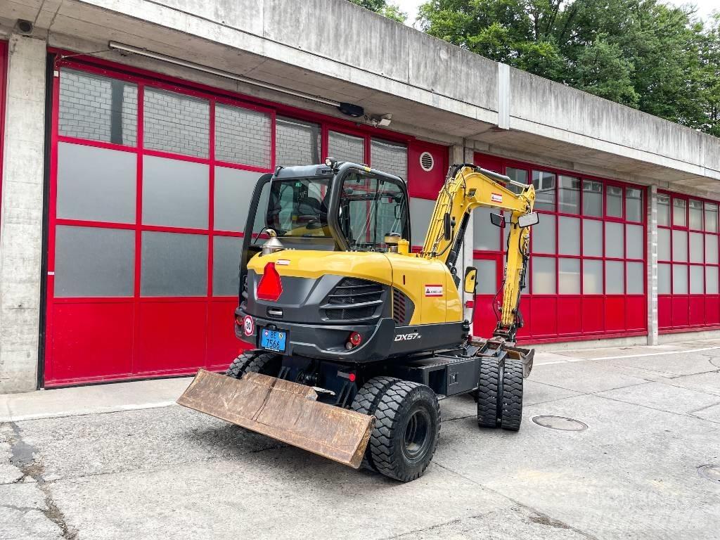 Doosan DX 57 W-5 حفارات بعجل