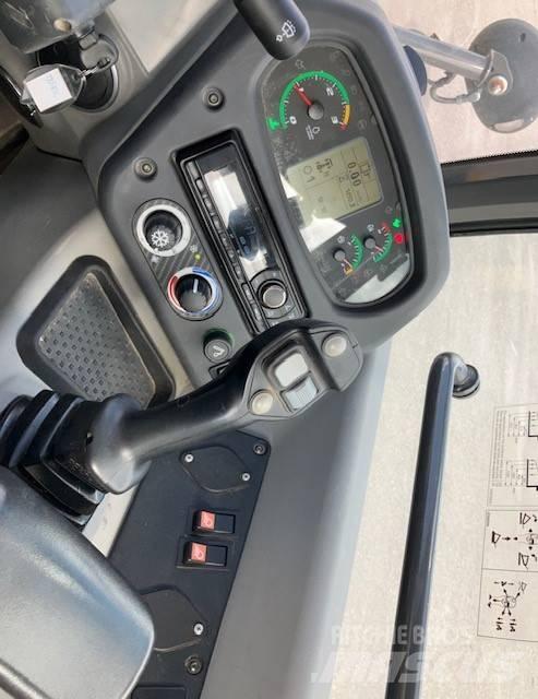 New Holland W70c لوادر بعجل