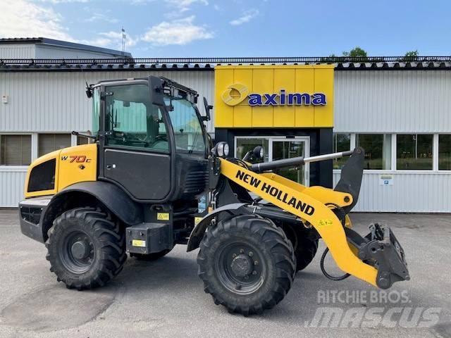 New Holland W70c لوادر بعجل
