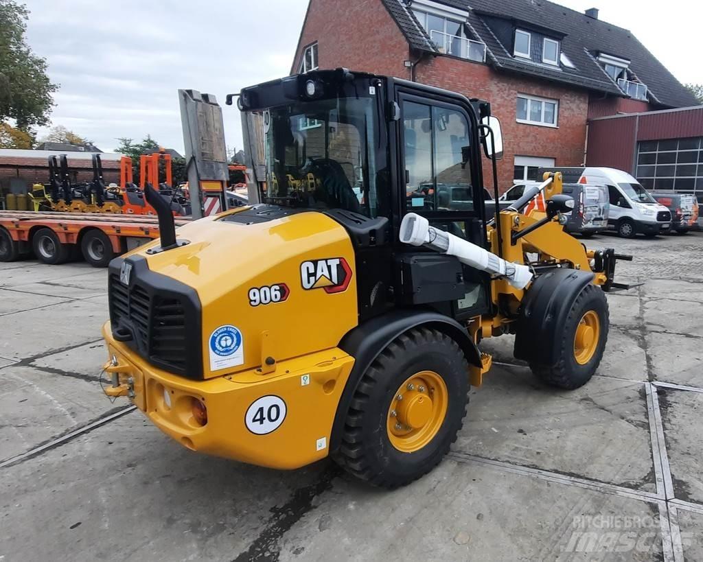 CAT 906 لوادر بعجل