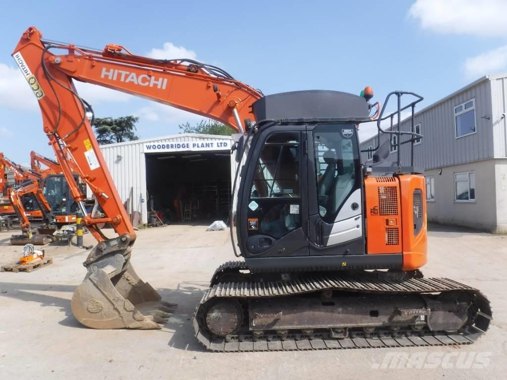 Hitachi ZX 135 US-6 حفارات زحافة