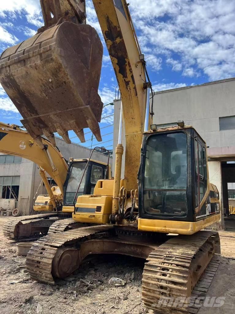 CAT 320BL حفارات زحافة
