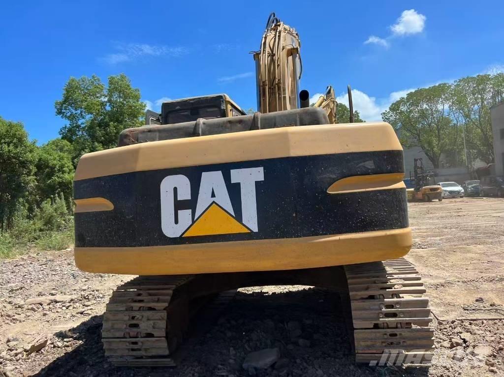 CAT 320 B L حفارات زحافة