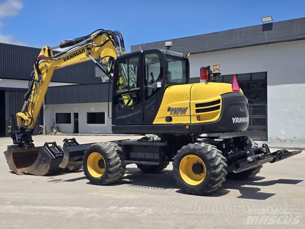 Yanmar B 110 W حفارات بعجل