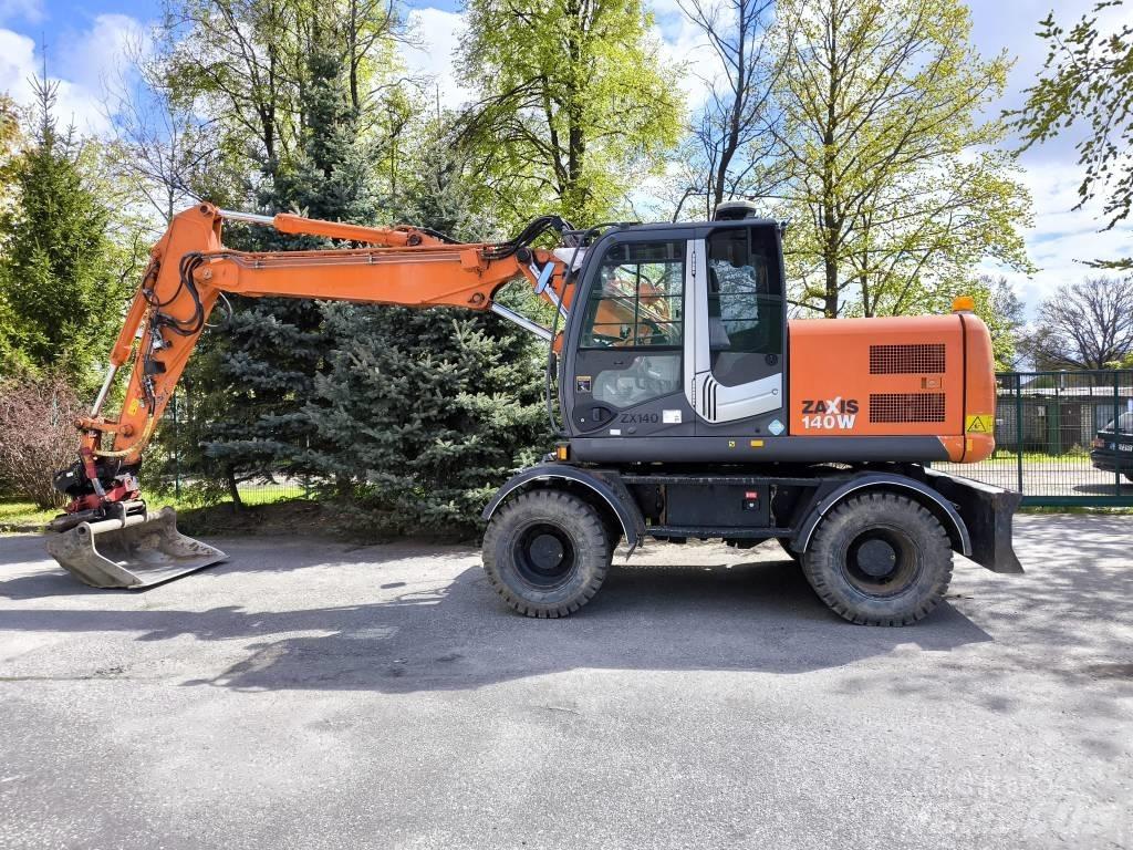 Hitachi ZX 140 W-3 حفارات بعجل