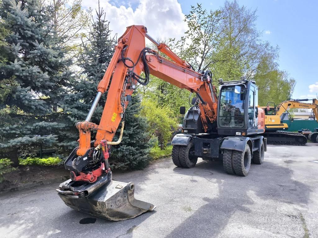 Hitachi ZX 140 W-3 حفارات بعجل