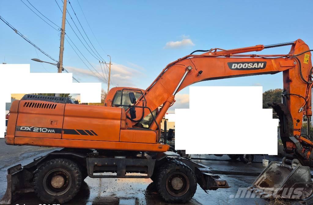Doosan DX 210 WA حفارات بعجل