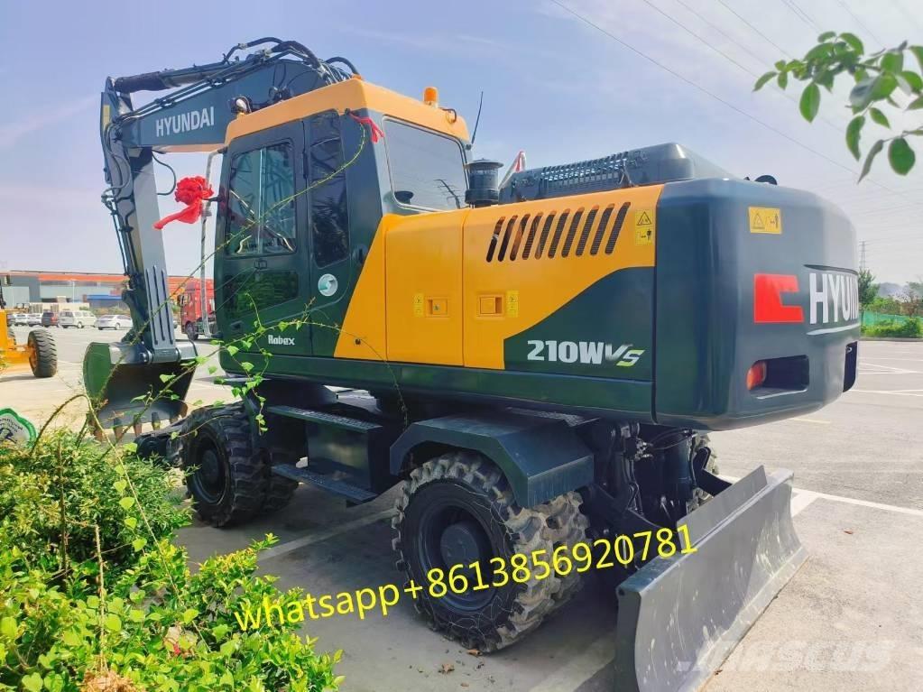 Hyundai W210-9 حفارات بعجل