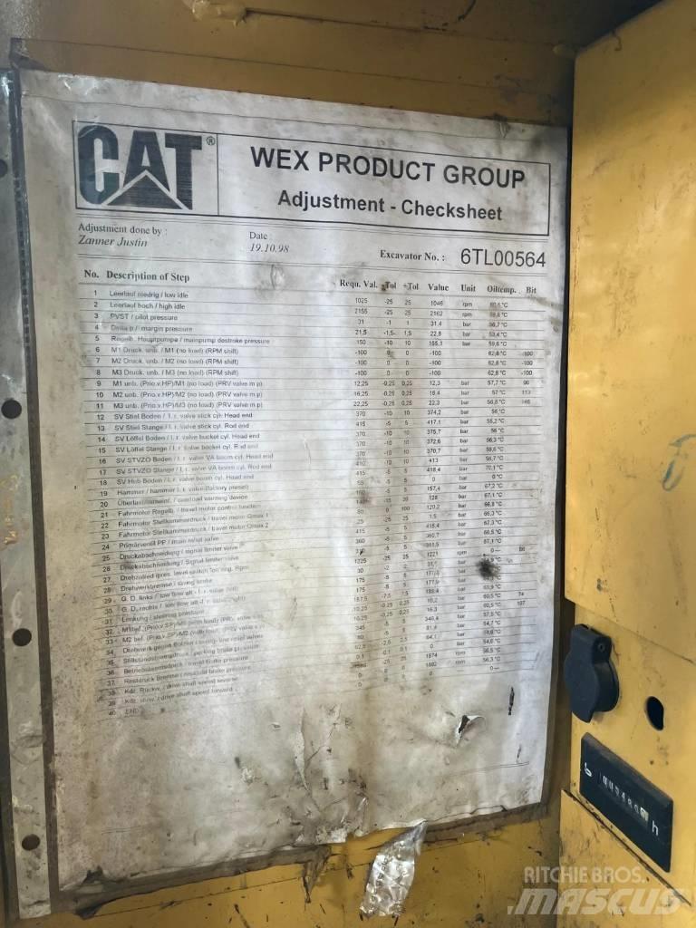 CAT M 312 حفارات بعجل