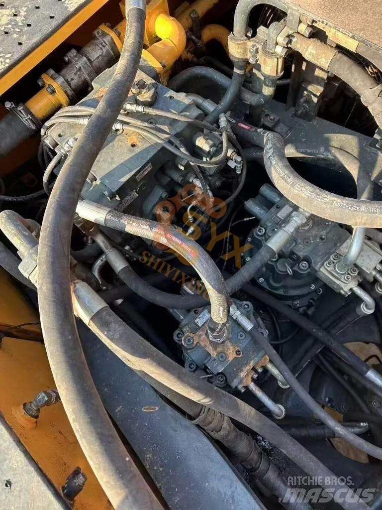 Hyundai Robex 520 VS حفارات زحافة