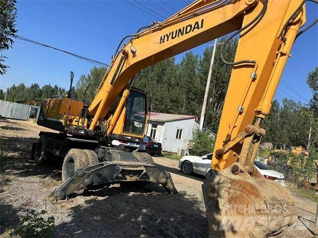 Hyundai 210W حفارات بعجل