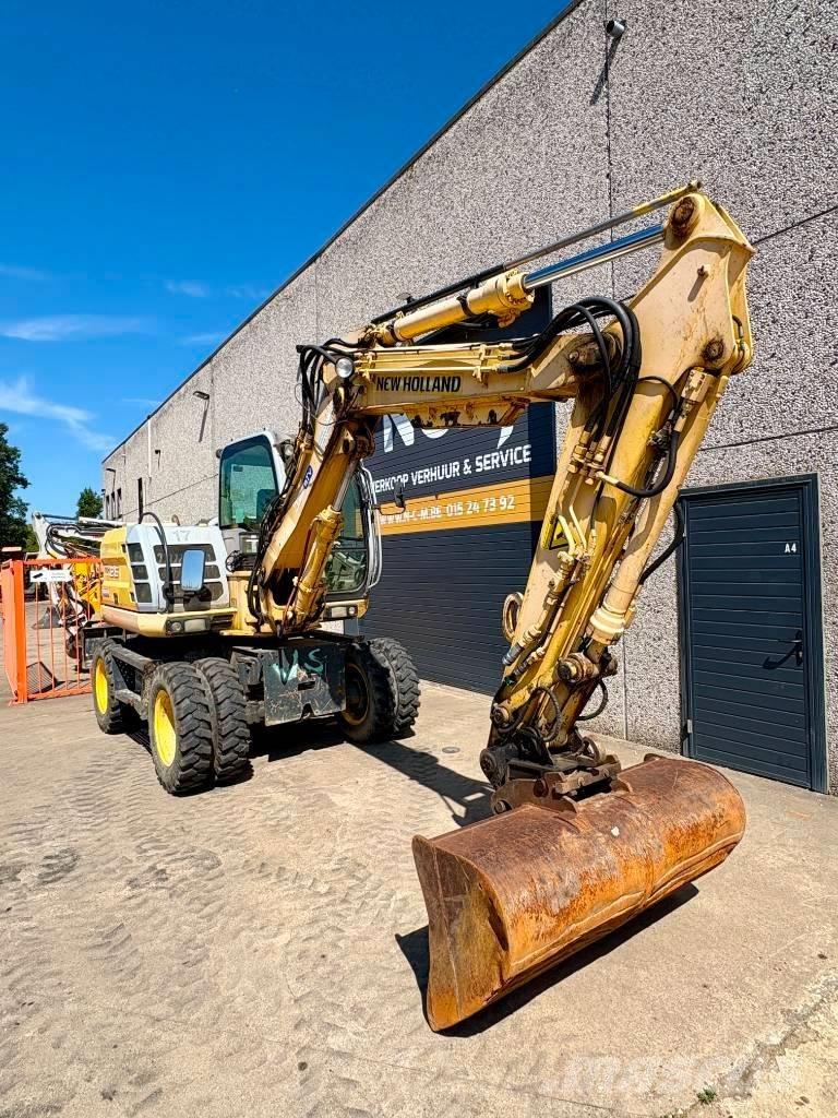 New Holland MH 2.6 حفارات بعجل