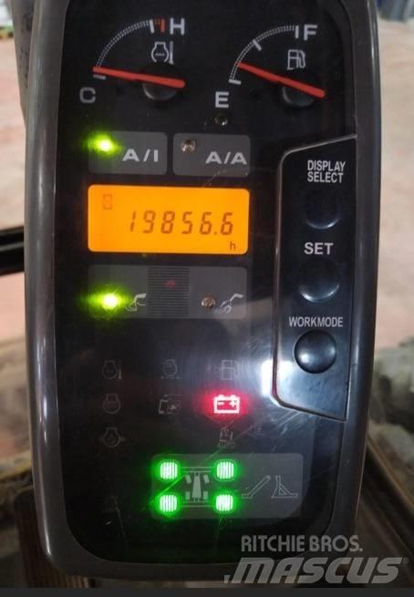 Hitachi ZX 210 W حفارات بعجل