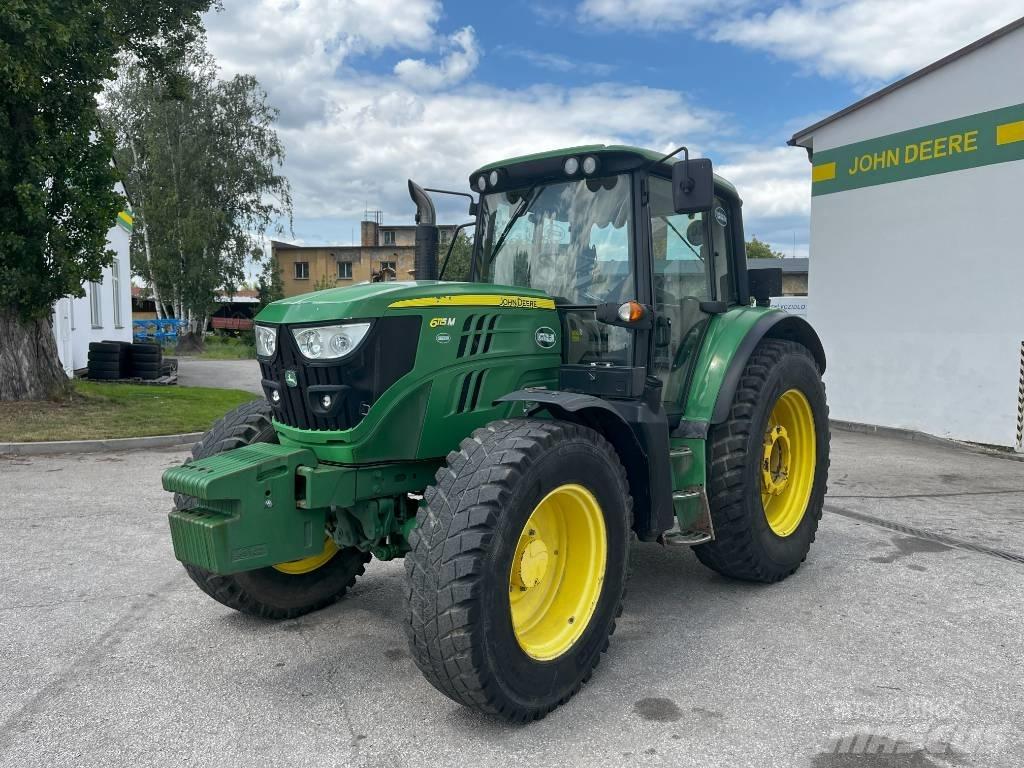 John Deere 6115 M الجرارات