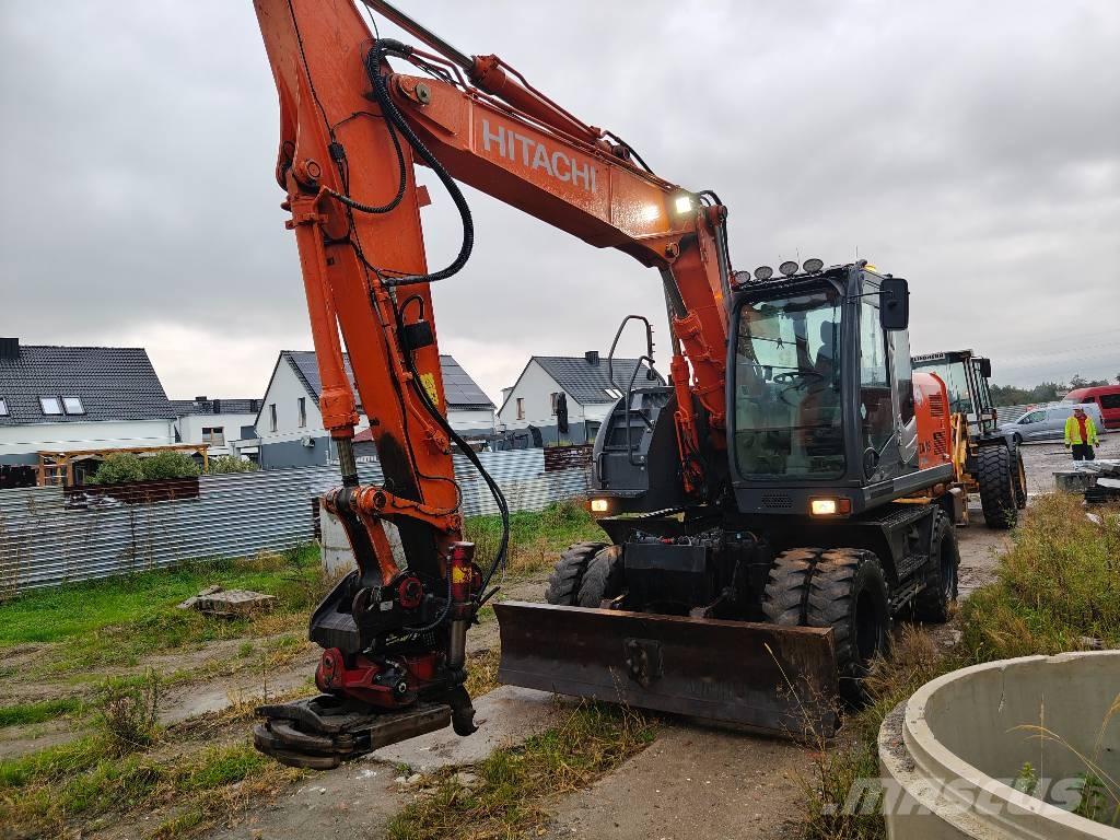 Hitachi ZX 140 W-5 حفارات بعجل