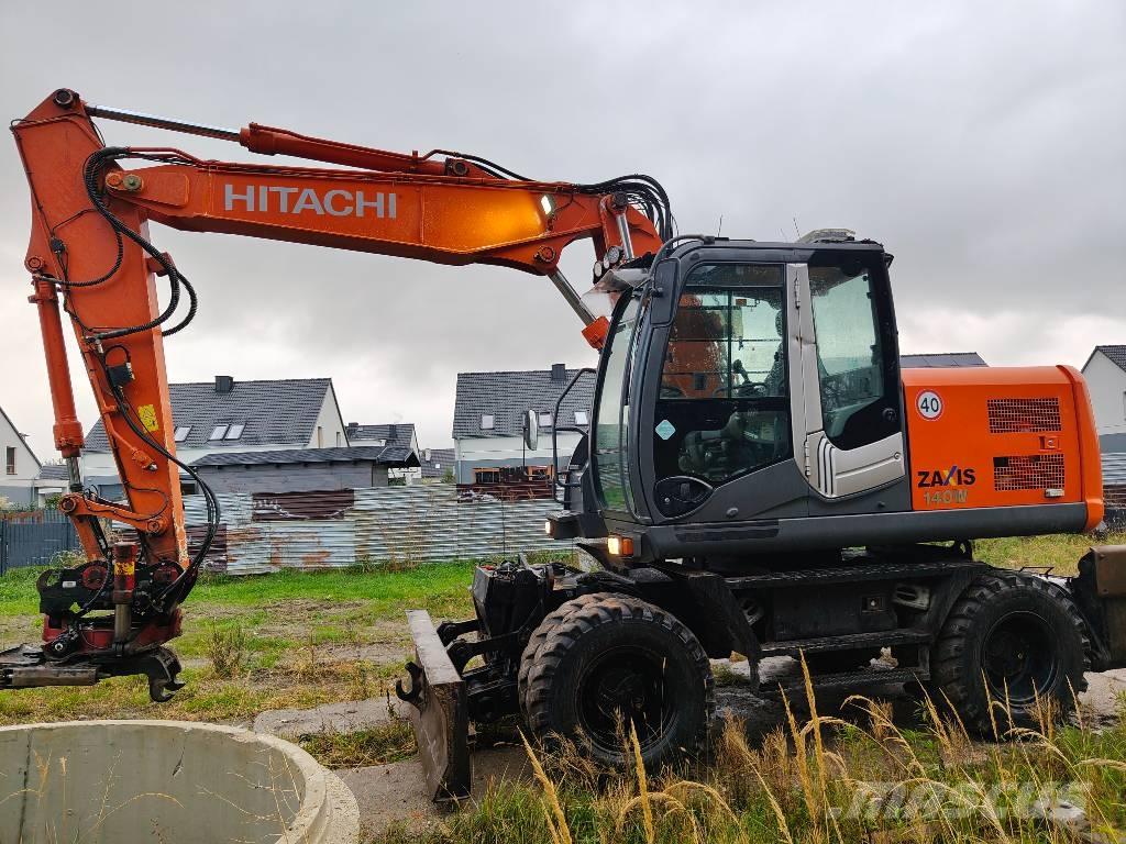 Hitachi ZX 140 W-5 حفارات بعجل