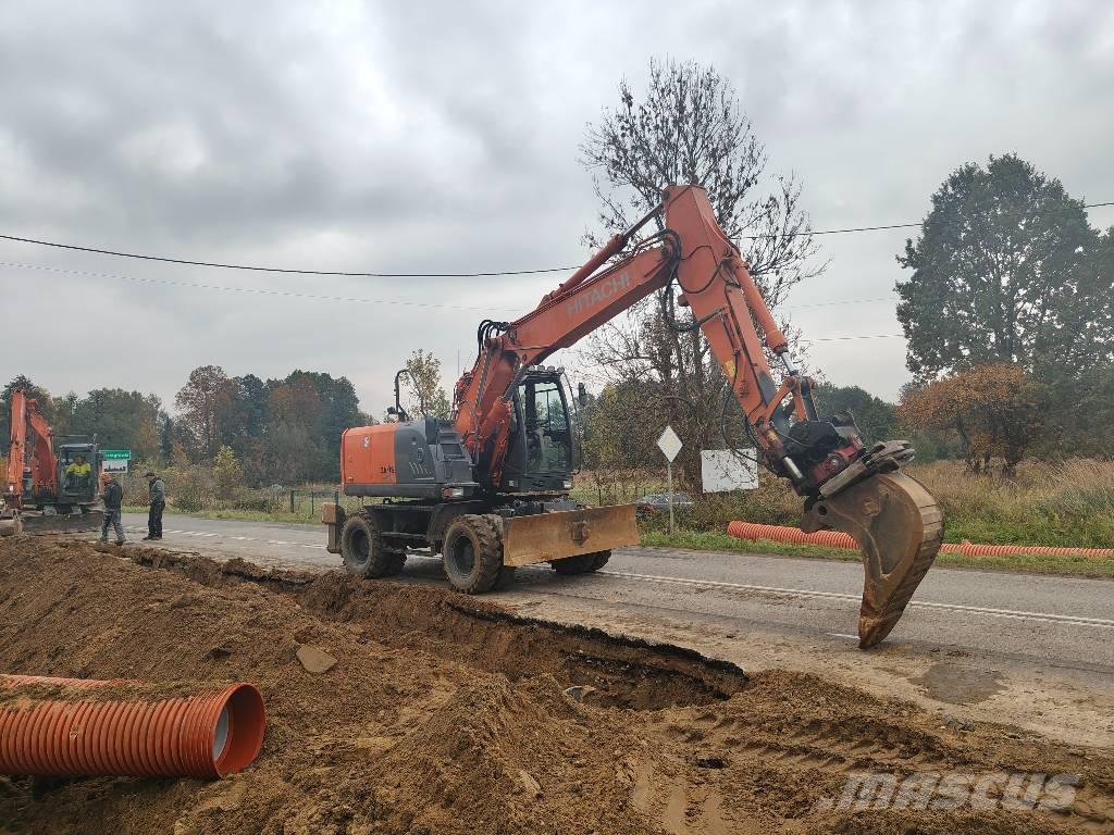 Hitachi ZX 140 W-5 حفارات بعجل