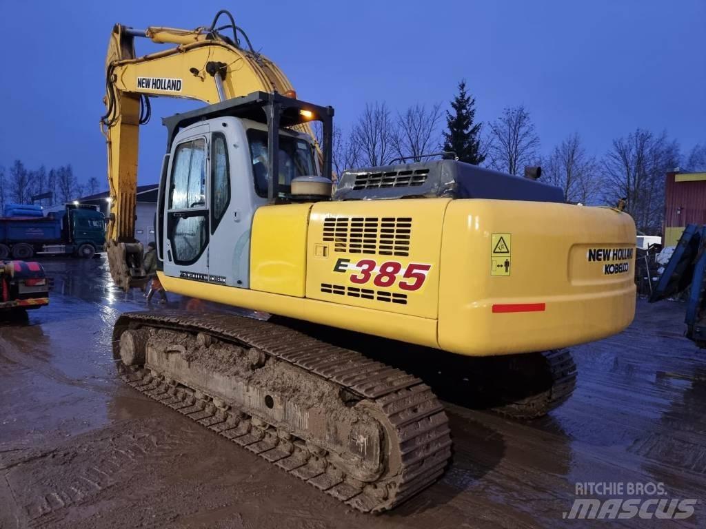 New Holland E 385 حفارات زحافة