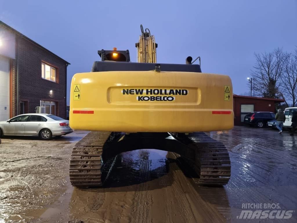 New Holland E 385 حفارات زحافة