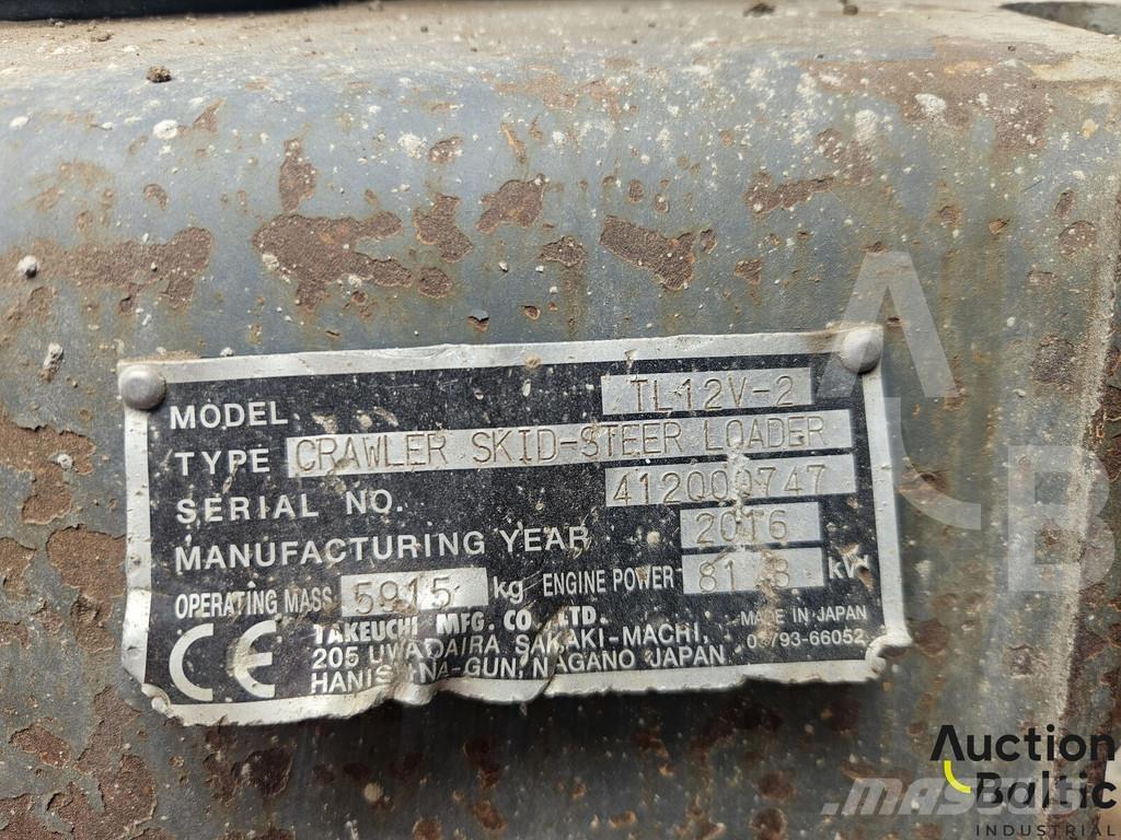 Takeuchi TL12V-2 لوادر زحافة